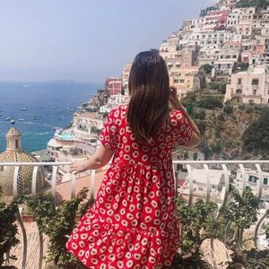 Dress bought in a small italian boutique. Very unique, looks brand new